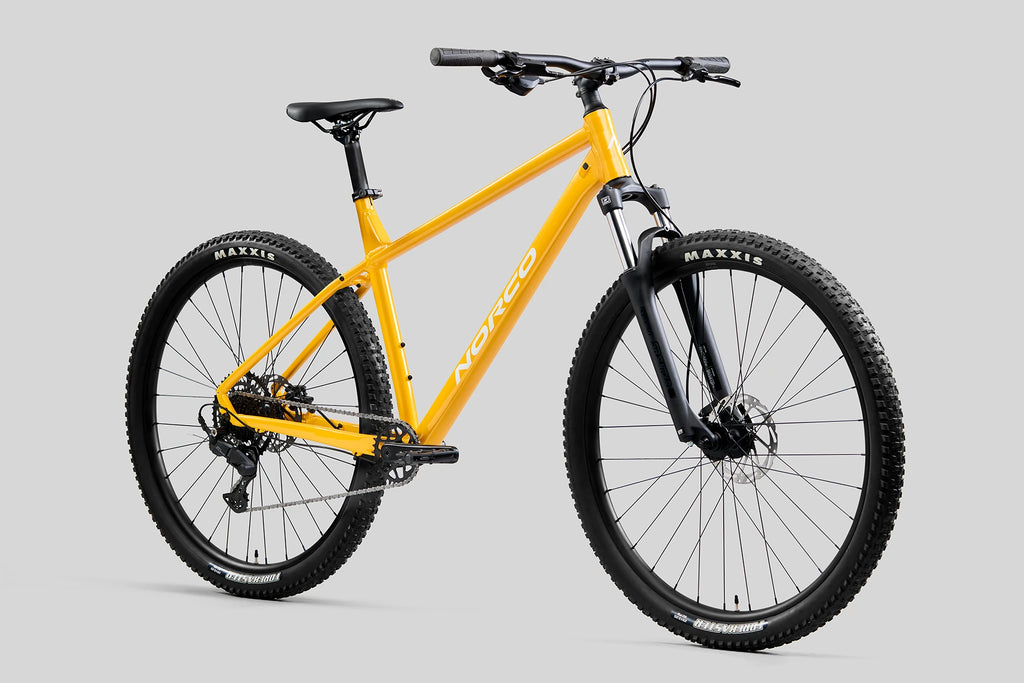 BICICLETA NORCO STORM 100 GOLDEN LARCH YELLOW