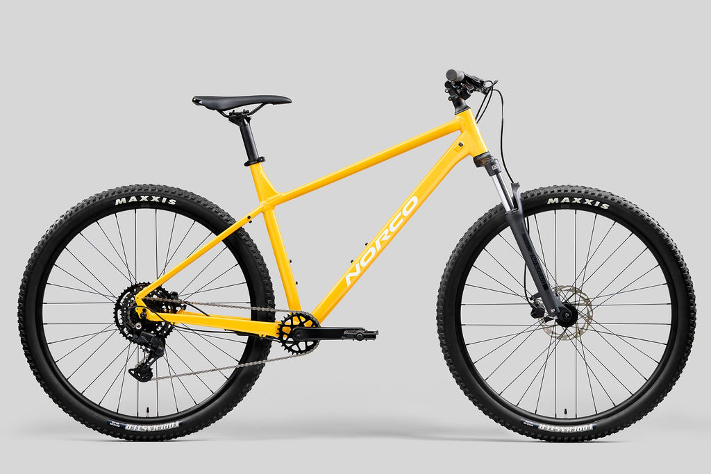 BICICLETA NORCO STORM 100 GOLDEN LARCH YELLOW